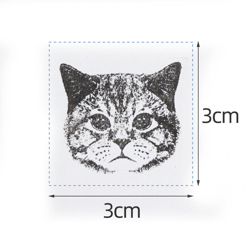 Custom pet portrait stamps in use on notebook with dog and cat stamps