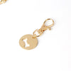 Bone charm set showing how the two halves fit together